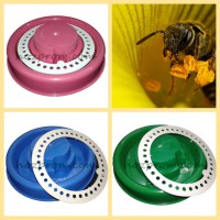 Поїлки та годівниці для бджил